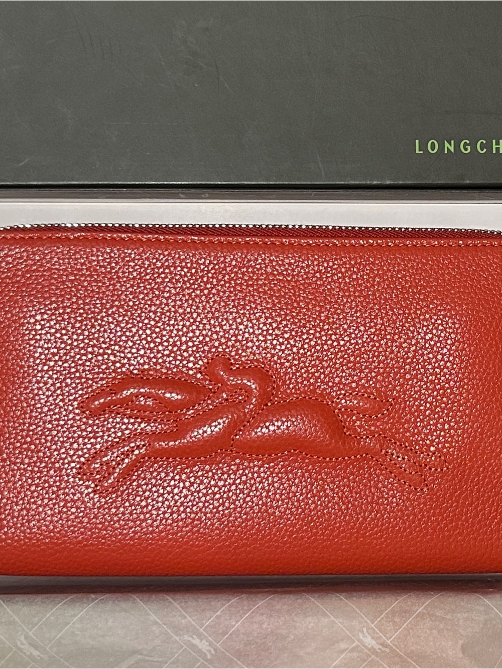 New Longchamp Red Pebbled Leather Zip-Around Wallet with Racing Horse Motif